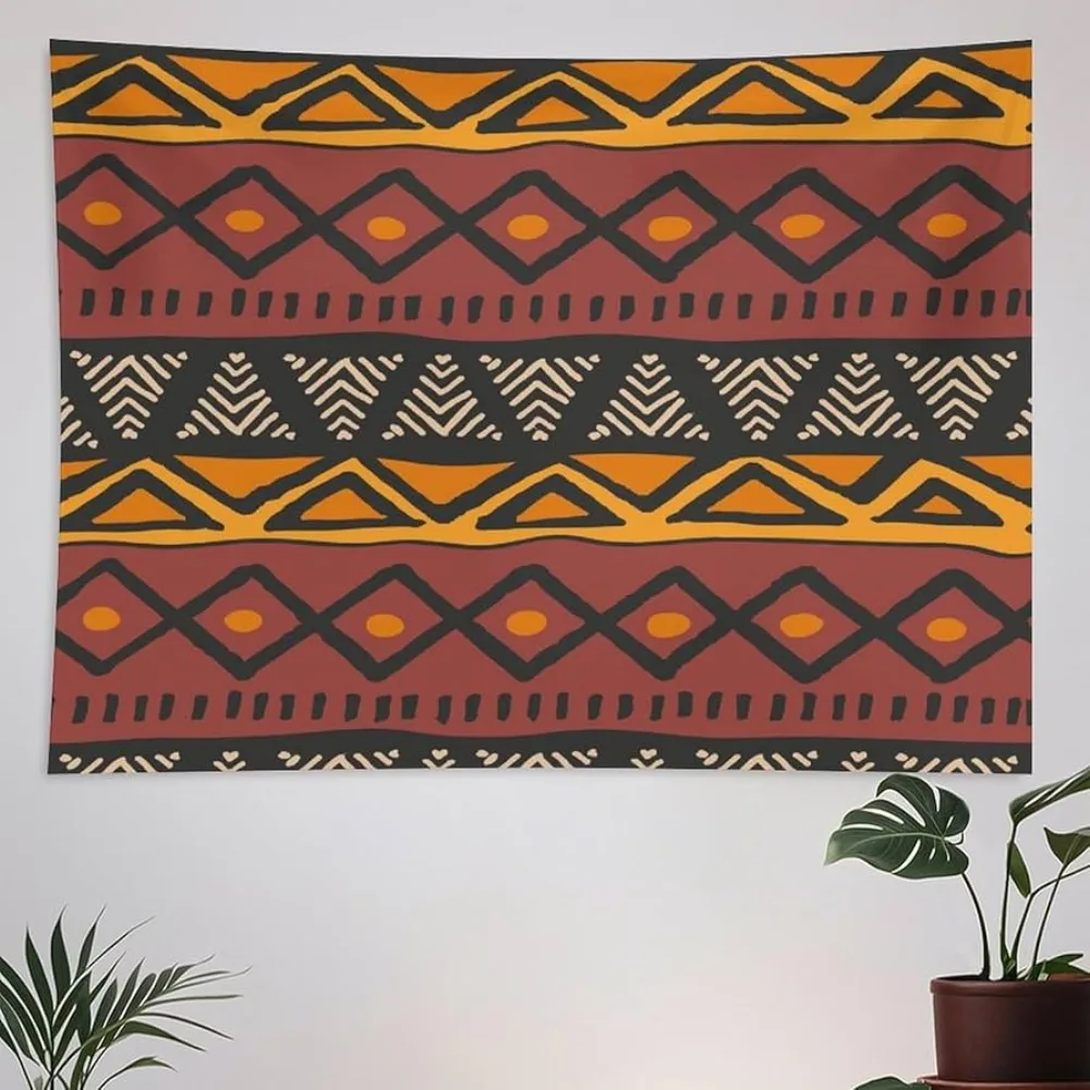 A traditional African textile, woven ochre, rust, gold, red, and green on a dark ground.